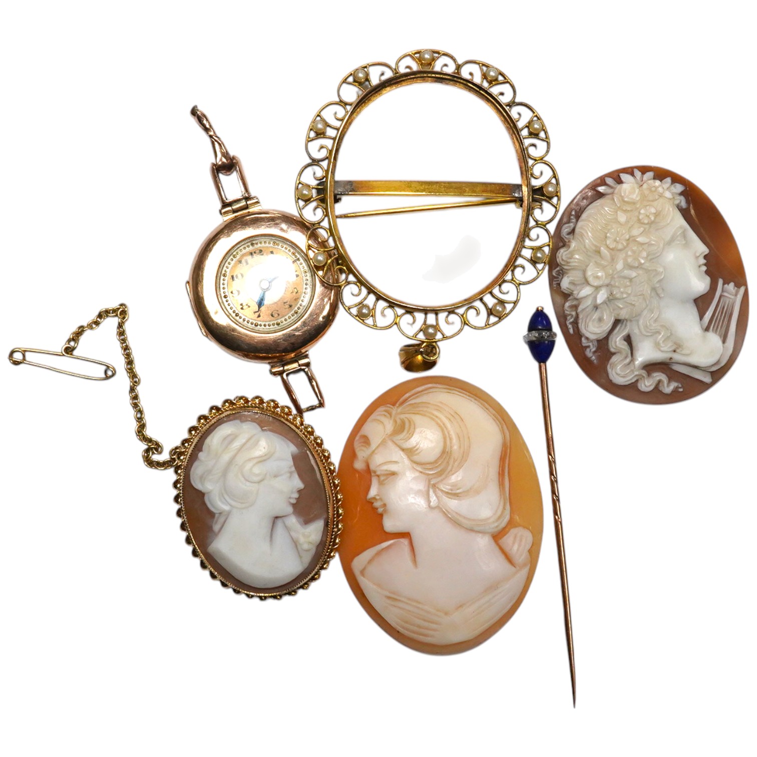 Three carved oval cameo shells, including tow in 9ct pendant or brooch mount, a 9ct gold wrist watch (a.f.) and a stick pin. Condition - poor to fair